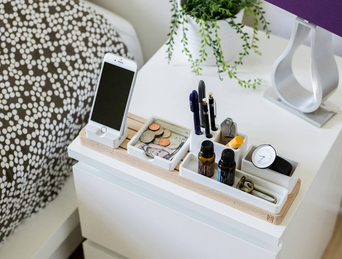 Before: cluttered drawer vs. after: organized MUJI acrylic tray with labeled sections
